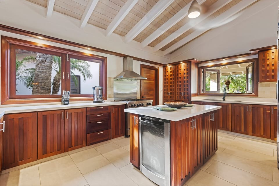 Mahogany cabinets/ Porcelain countertops/ commercial appliances 