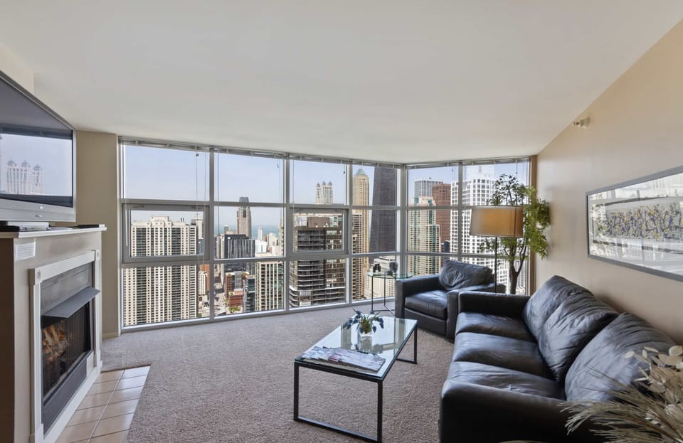 Living room with world class views, fireplace and queen sleeper sofa