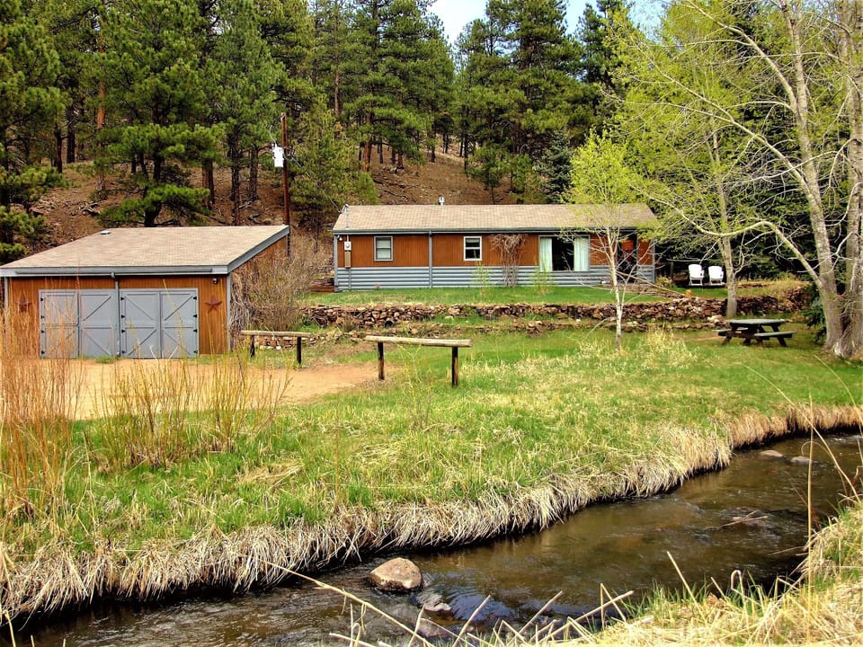 Beautiful, remodeled cabin sits back off creek with ample parking!!