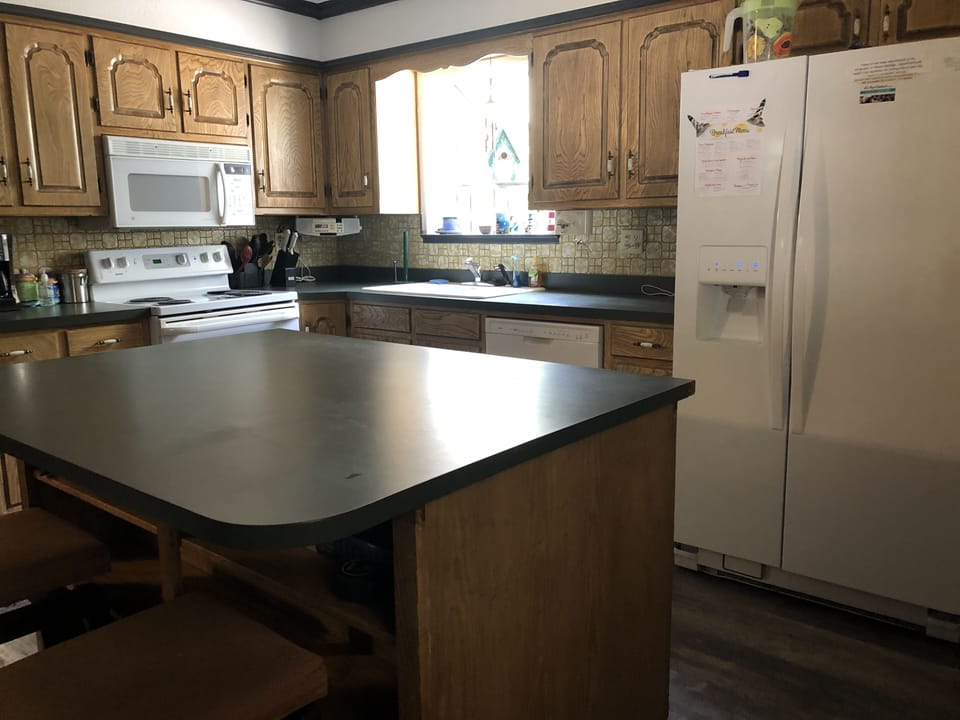 Kitchen, Frig, Micro, Dishwasher, Coffee Bar.