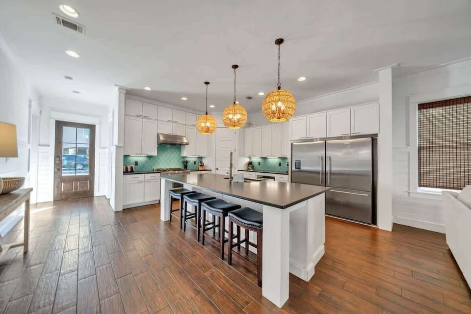 1st Floor Gourmet Kitchen with Stainless Appliances Gas Range