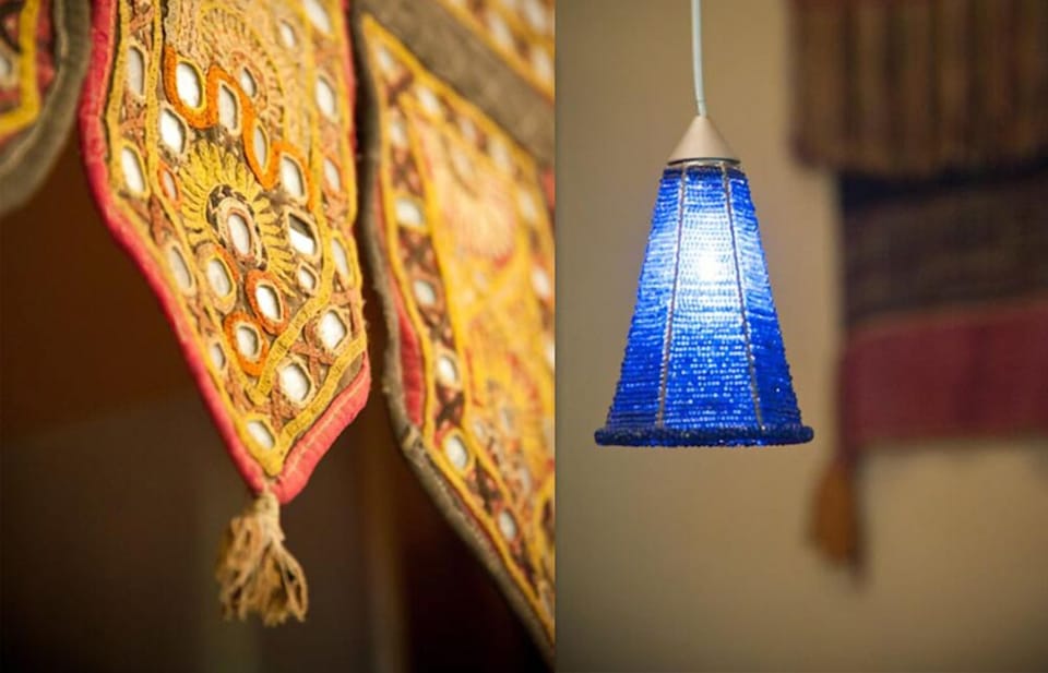 Textiles from Rajesthan, Loas, and Africa - all lighting on dimmers...