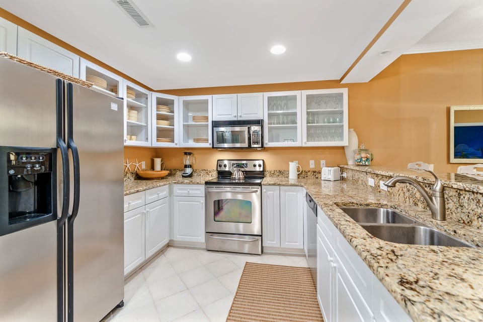 Stove, oven, Dishwasher, Garbage Disposal, Fridge with icemaker/water dispenser
