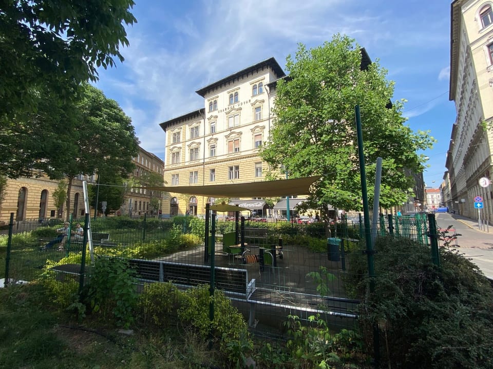 Our building with the small playground in front of it