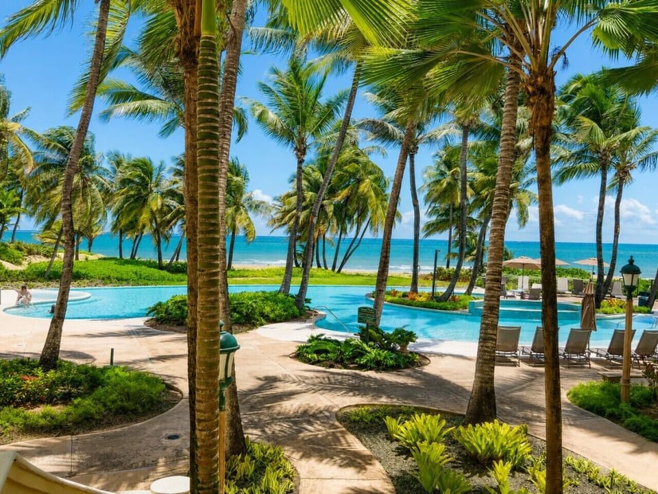 Wake up to the beauty of Puerto Rico with the beach just steps from your door. Enjoy tropical surroundings, ocean breezes, and the relaxed atmosphere of Wyndham Rio Mar.
