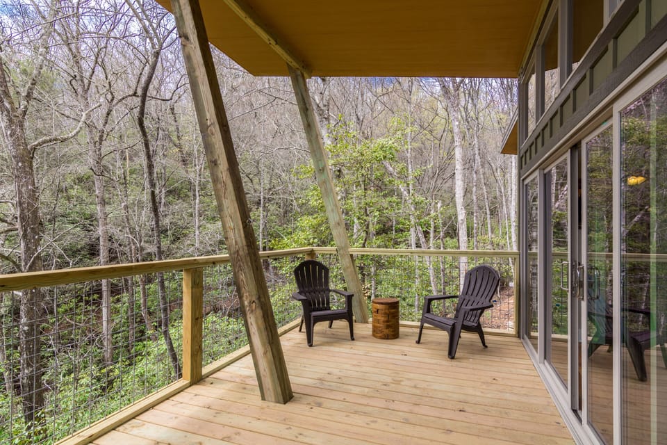 Each cabin features expansive covered back deck.
