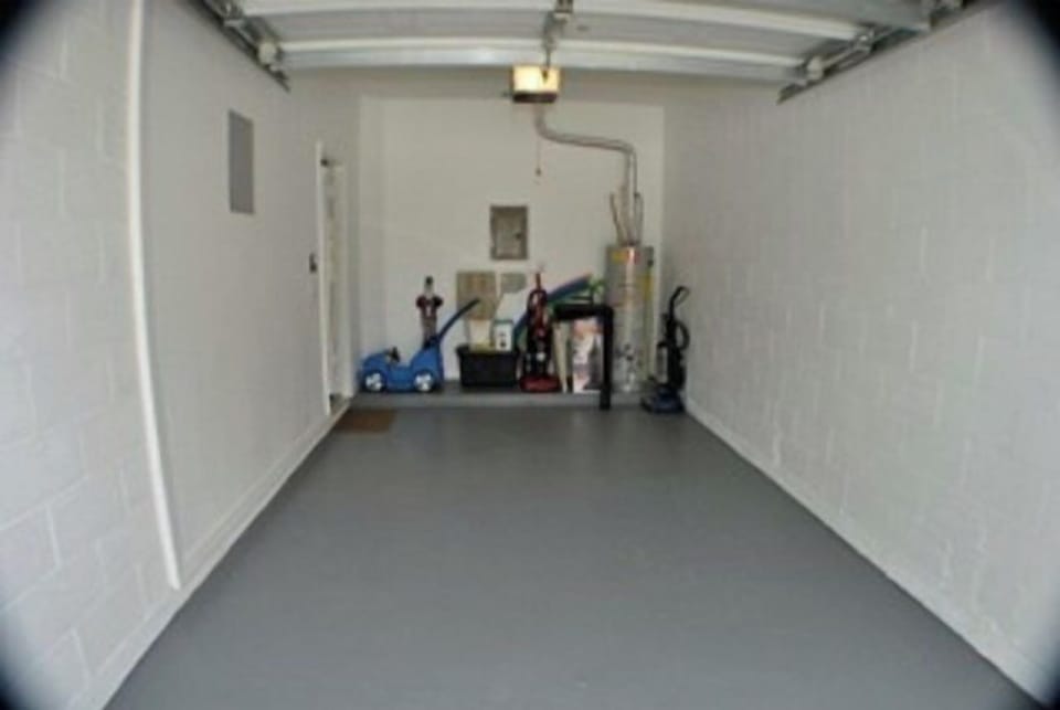 Garage with entrance to home