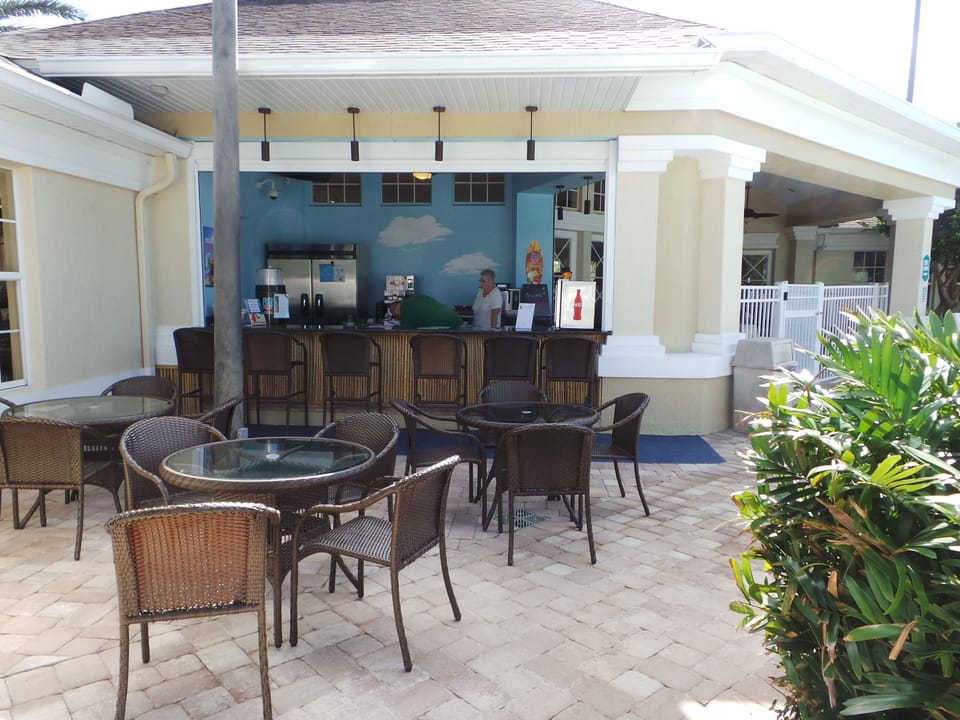 have lunch or a cold drink by the pool