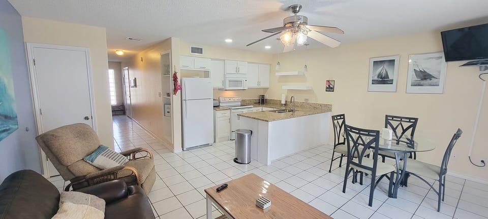 Living room, kitchen, and hallway