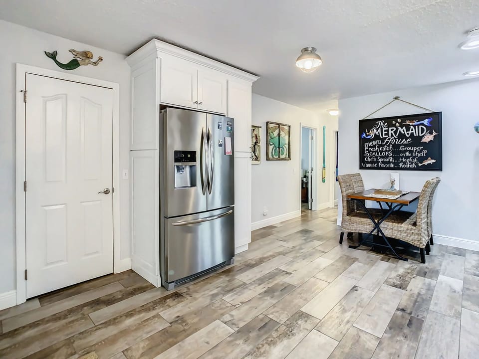 Refrigerator and second small dining area.