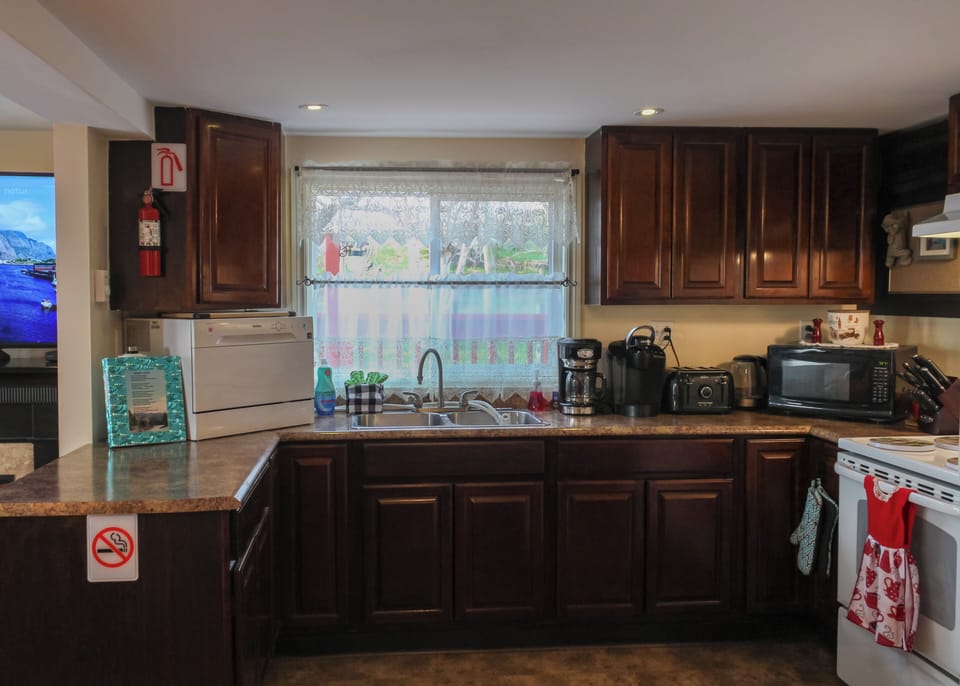 Kitchen is fully functional and has all usual major appliances, full size F/S