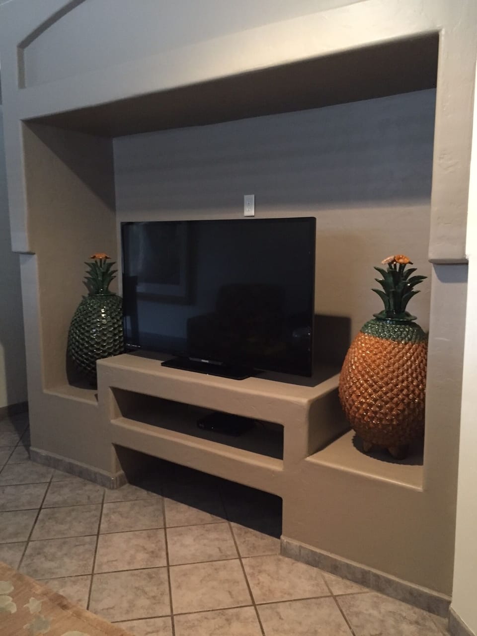 Living area with large flat screen television