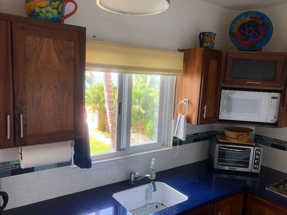 More of this cute kitchen with sparkling blue counters