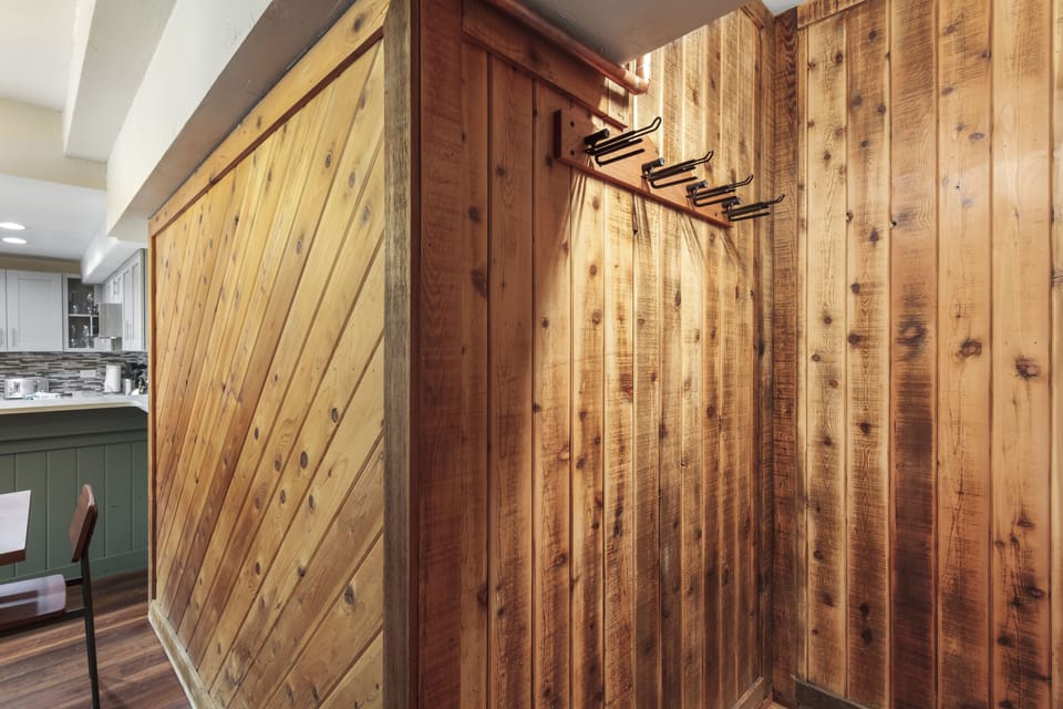 Entrance foyer has ski hooks