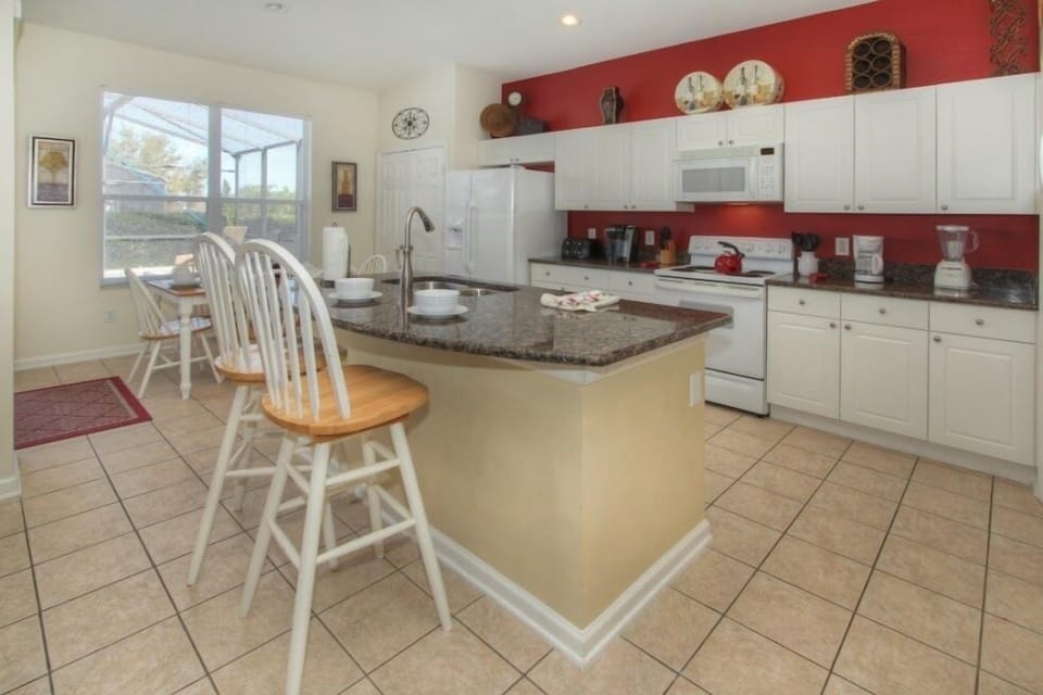 Fully equipped kitchen with granite countertops!
