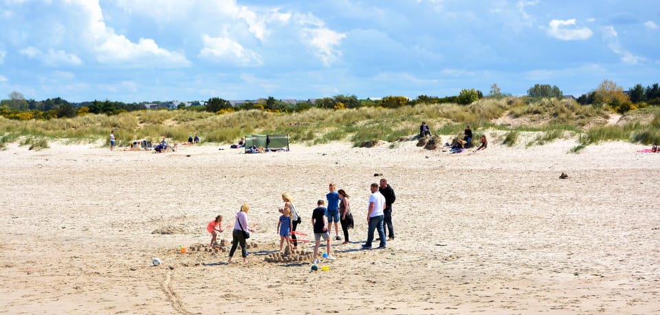 Building sandcastles on Nairn Beach
