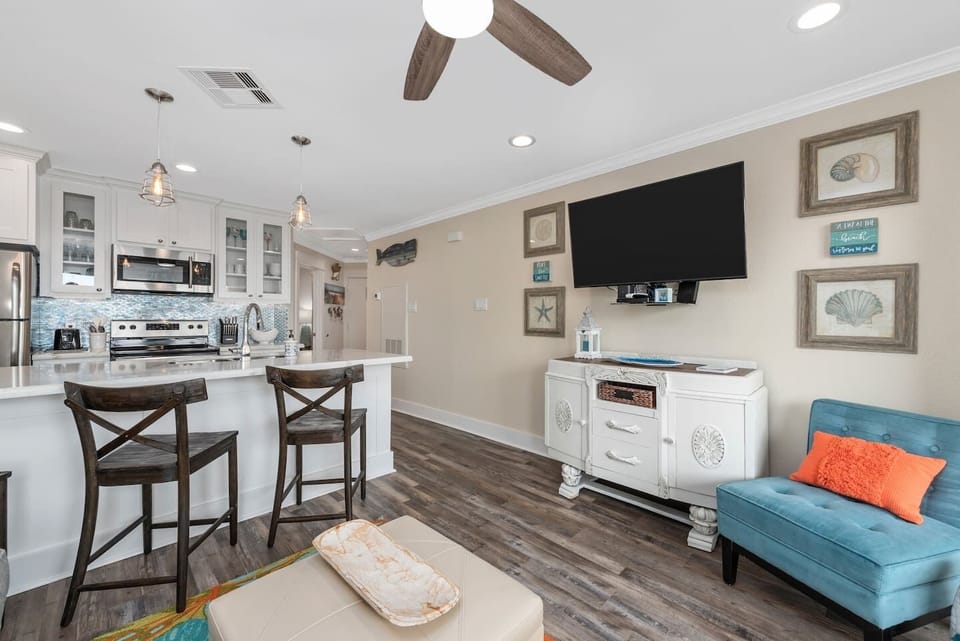 Flat panel tv in the den with over 100 channels on Direct TV provided.