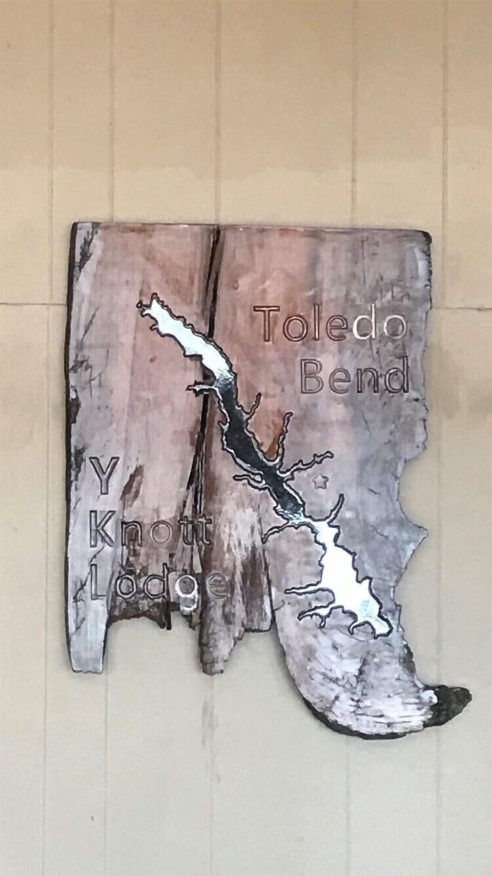 YKnott Lodge sign in living room made from "sinker maple" from Toledo Bend