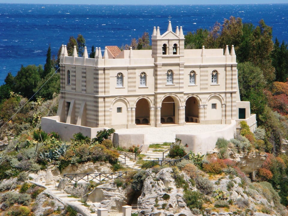 Overlooking the sea on a rock at Tropea the stunning church of Maria dell 'Isola