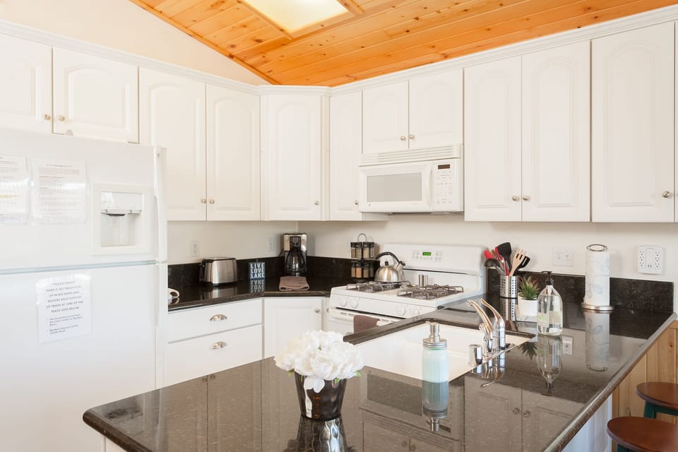 Open kitchen with breakfast bar. great room.