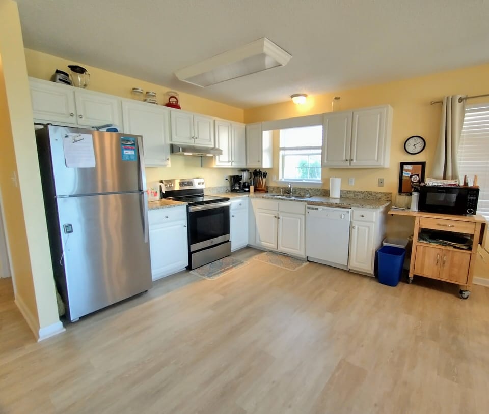 Bright and open kitchen. Fully stocked