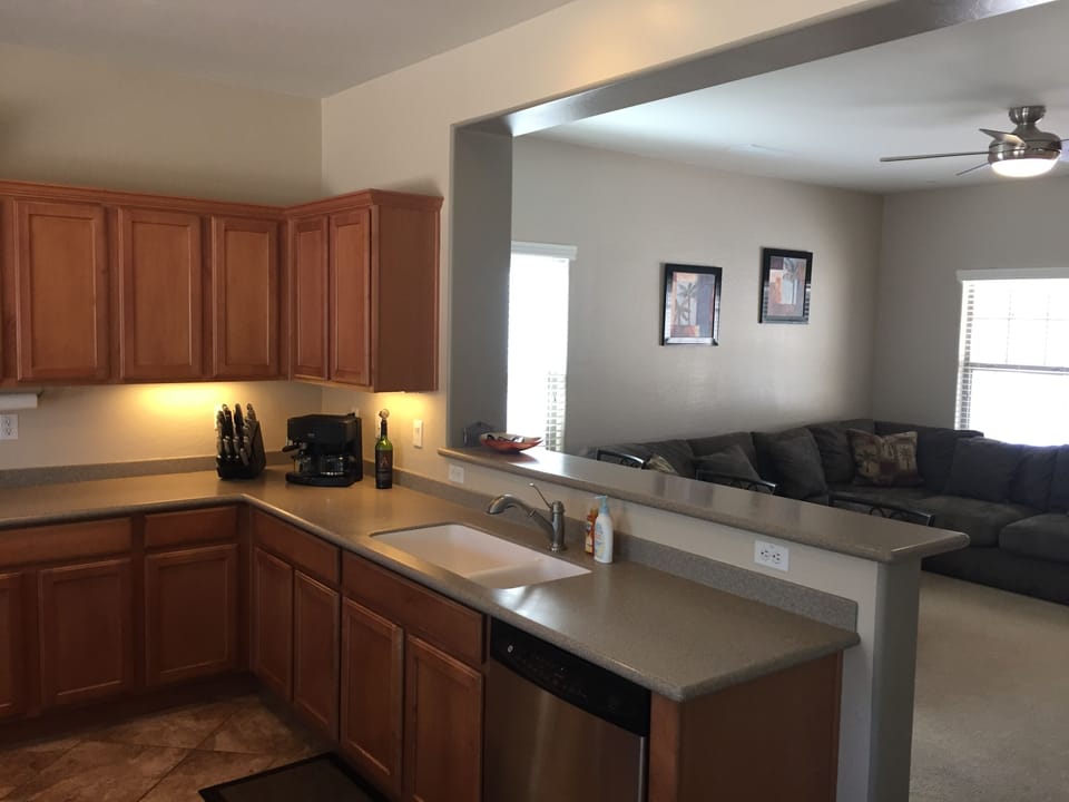 Kitchen sink into living room view