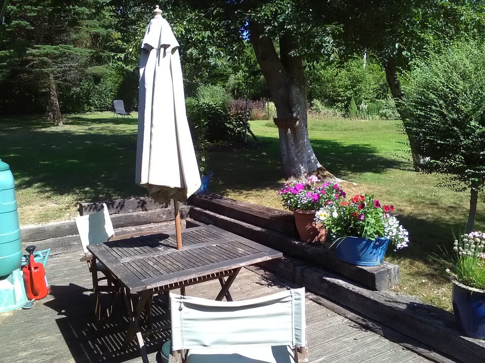 Lovely sunny deck with seating , perfect for setting for breakfast