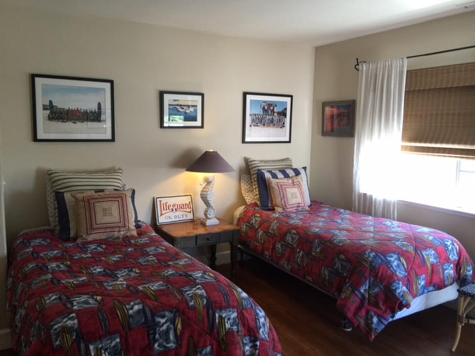 Lifeguard room with extra long Twin beds, full bathroom and small deck