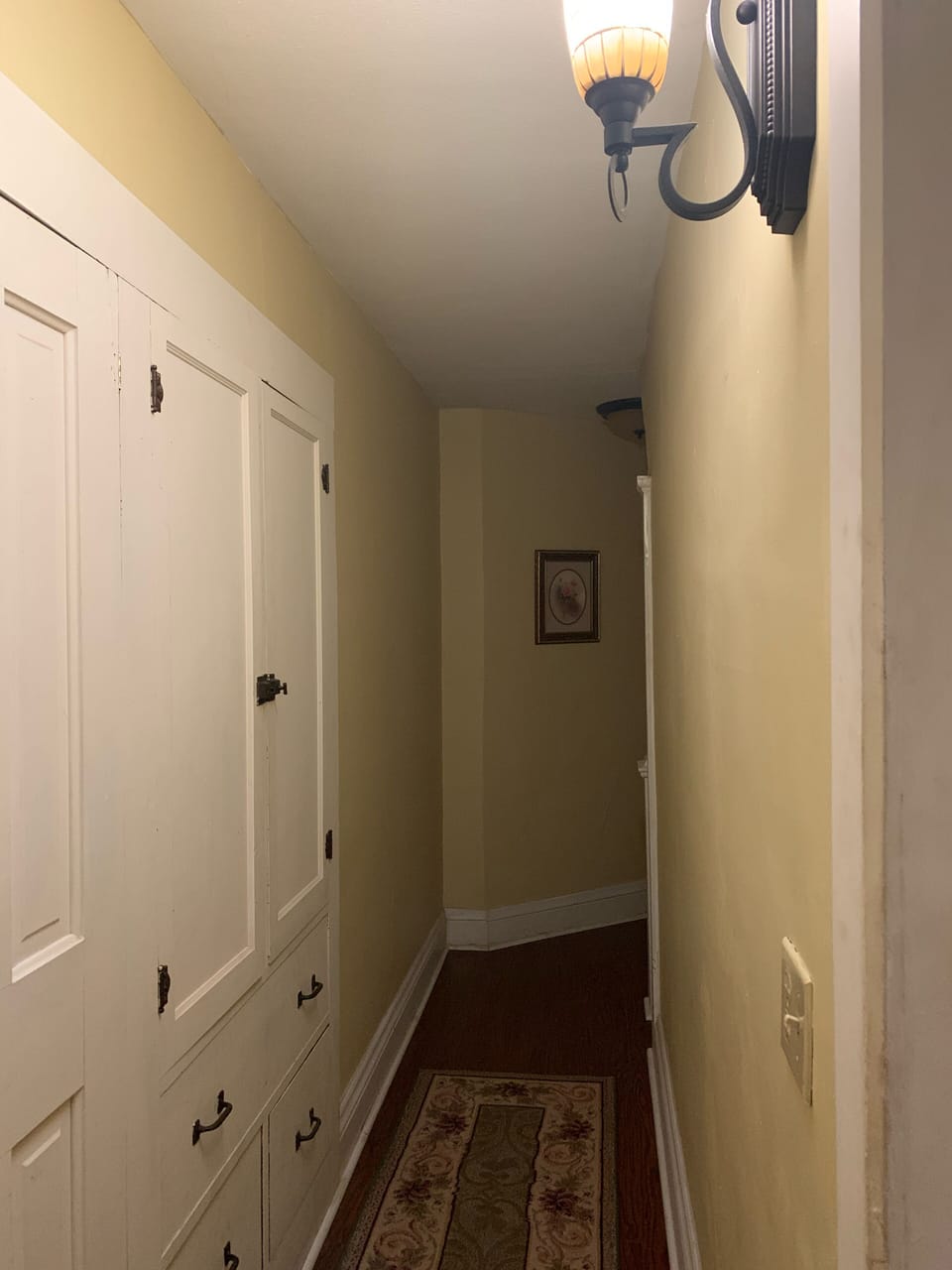 Hallway leading to upstairs bathroom 