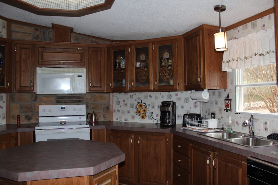 Kitchen equipped with lots of extras