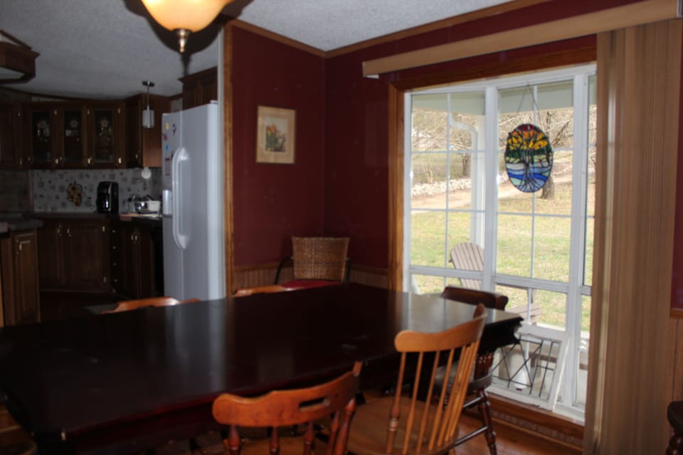 Dining with front porch/yard views.  Watch the birds