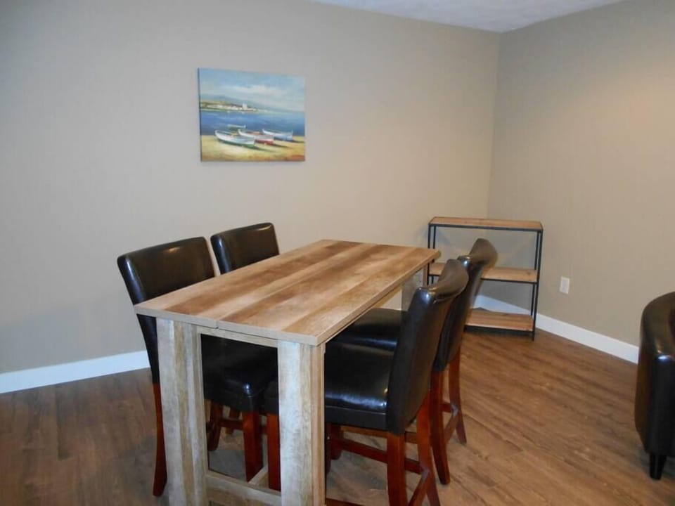 Plenty of room in the lower level rec room to play games and watch television.