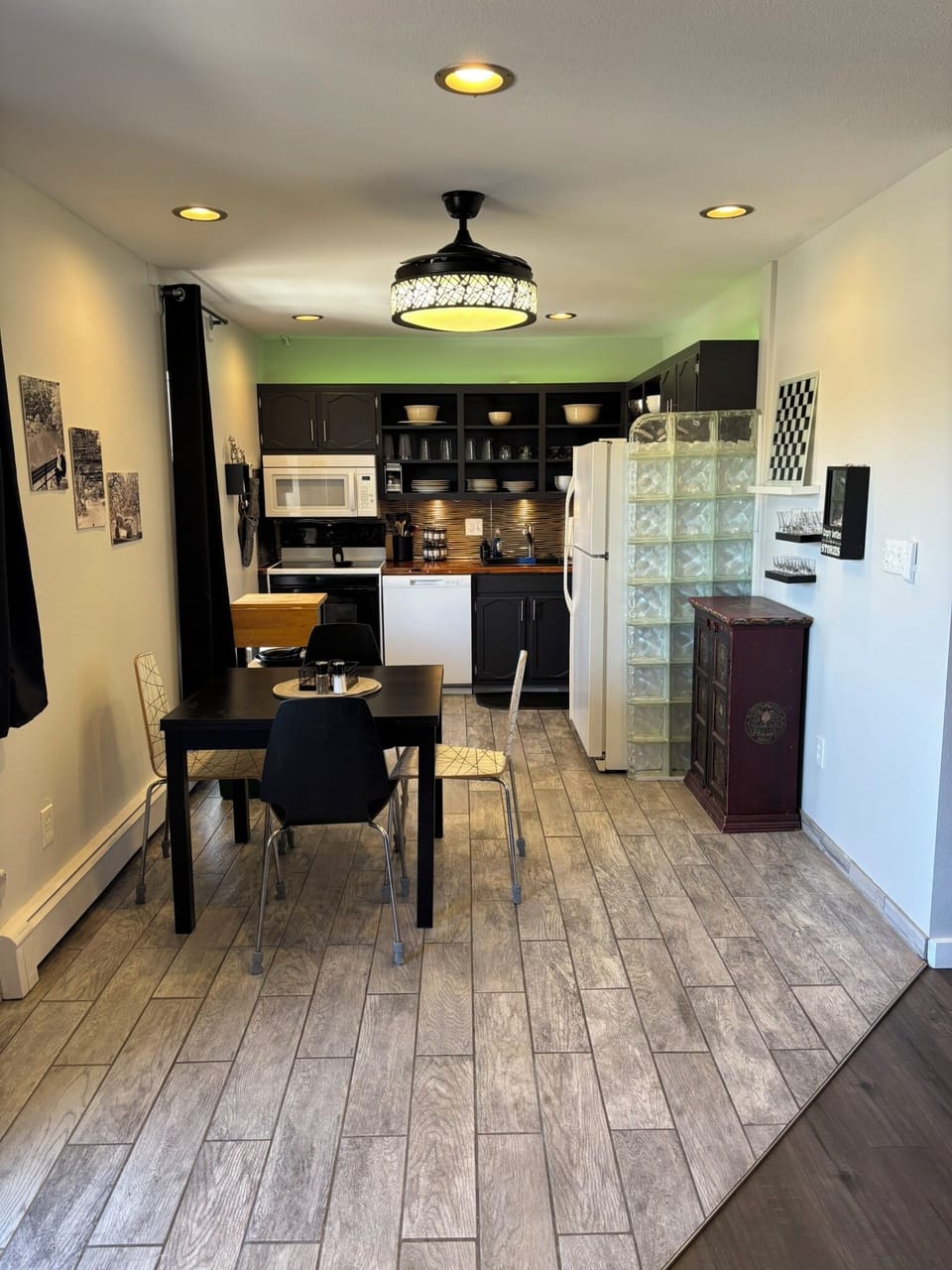 Kitchen with fun uplights and downlights.