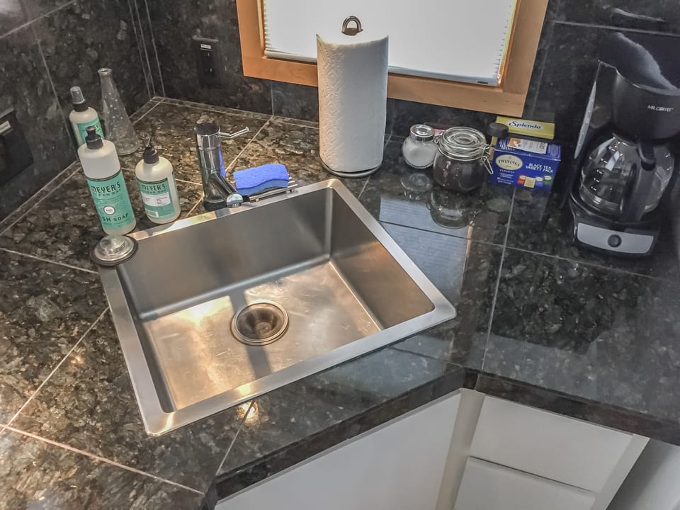 Kitchen sink/coffee maker.