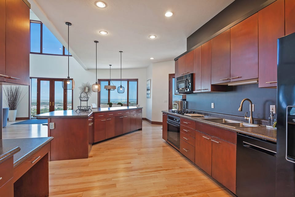 Contemporary designed kitchen with spacious cabinetry 
