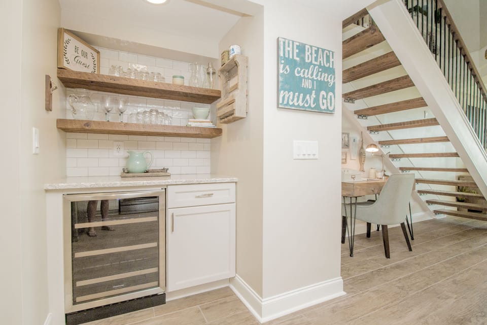 Beverage center outfitted with all the glassware and drink prep you'll need. 