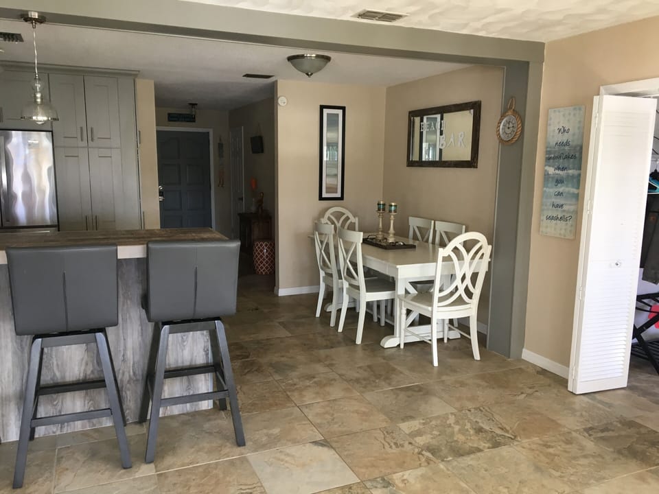 Dining for 6. Kitchen seats a total of 12 people. 