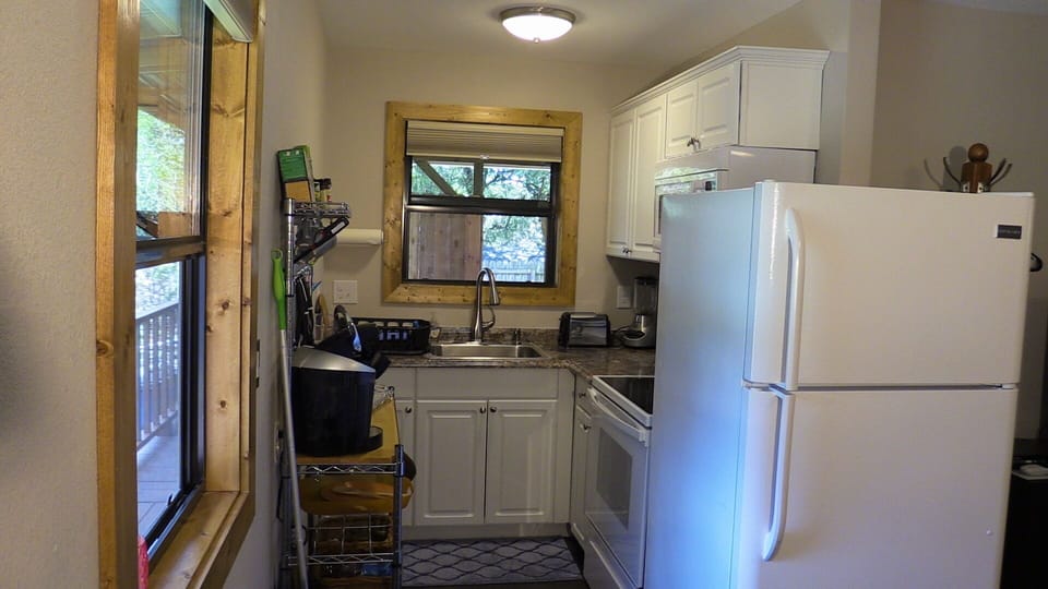 full kitchen - with stove, microwave & refrigerator