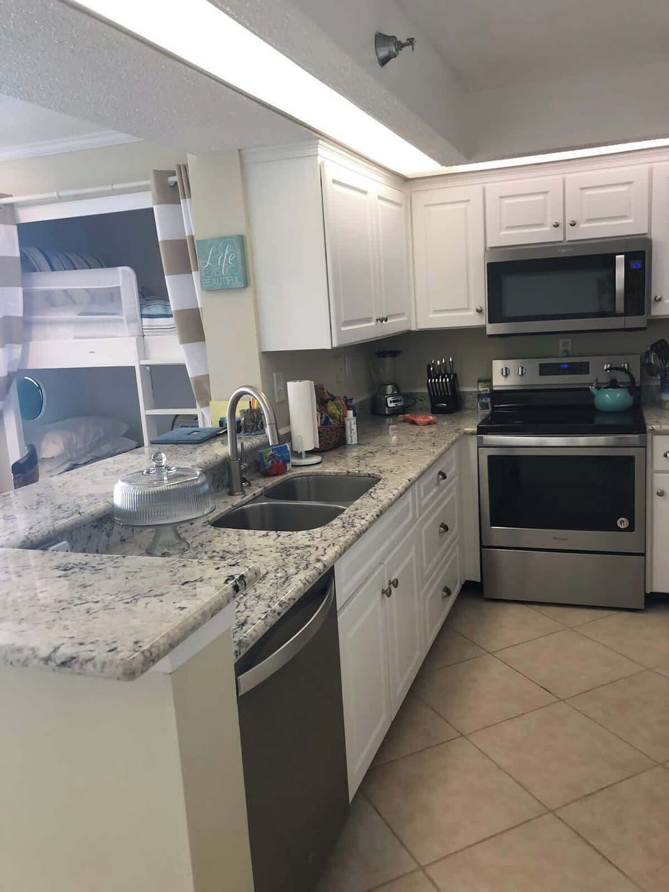 Upgraded Kitchen with Granite Counter Tops and Stainless Steel Appliances