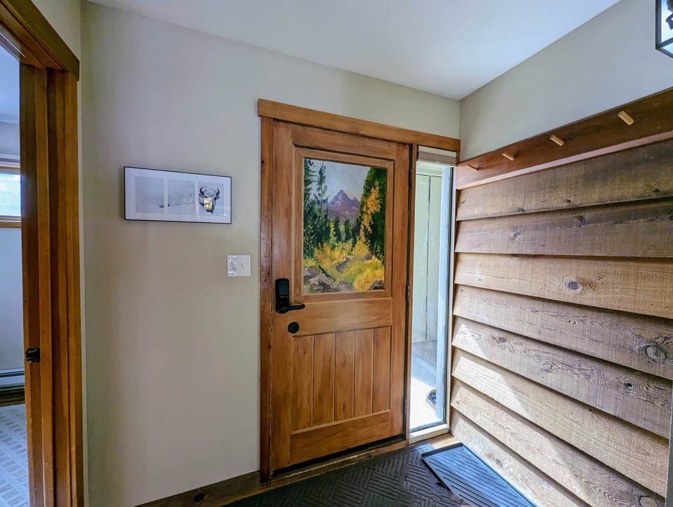 Front entry area has ample hooks and area for boots (1)