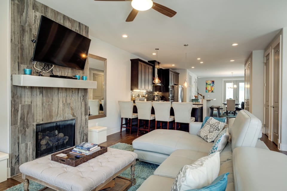 Open Concept. Living Room with 50 inch TV, DVD player, Roku and Gas Fireplace