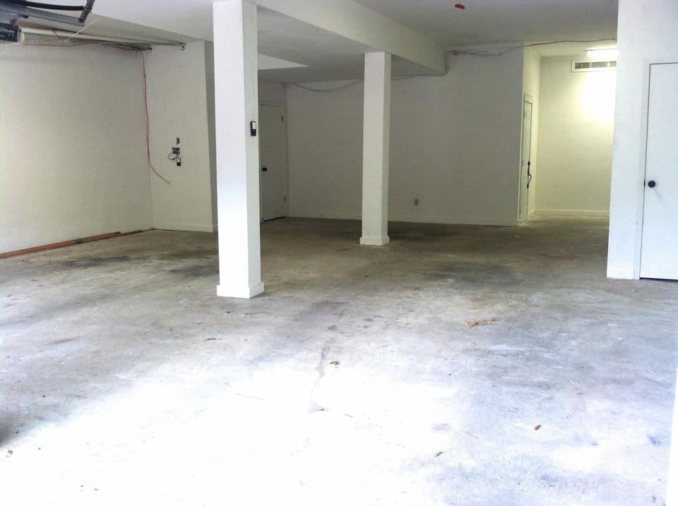 The basement garage and large parking area can accommodate up to 5 vehicles.