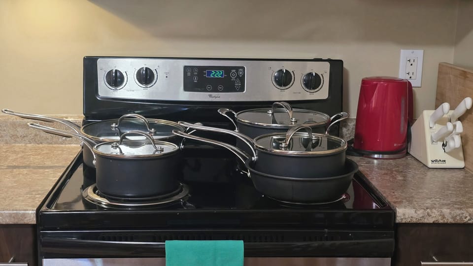 New pots and pans, electric kettle, knives with built in sharpener