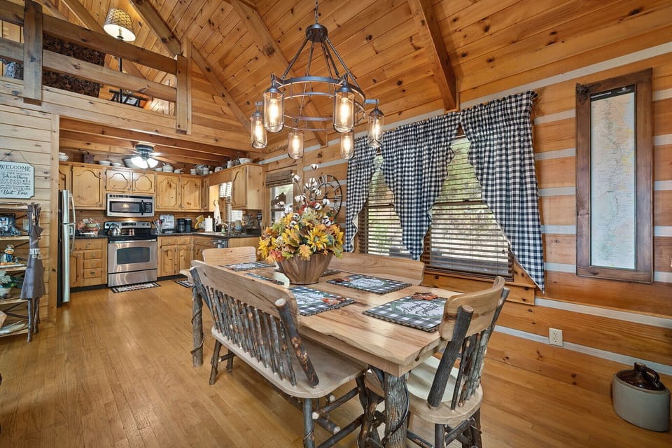 Large farmhouse table and benches provide plenty of dining space.
