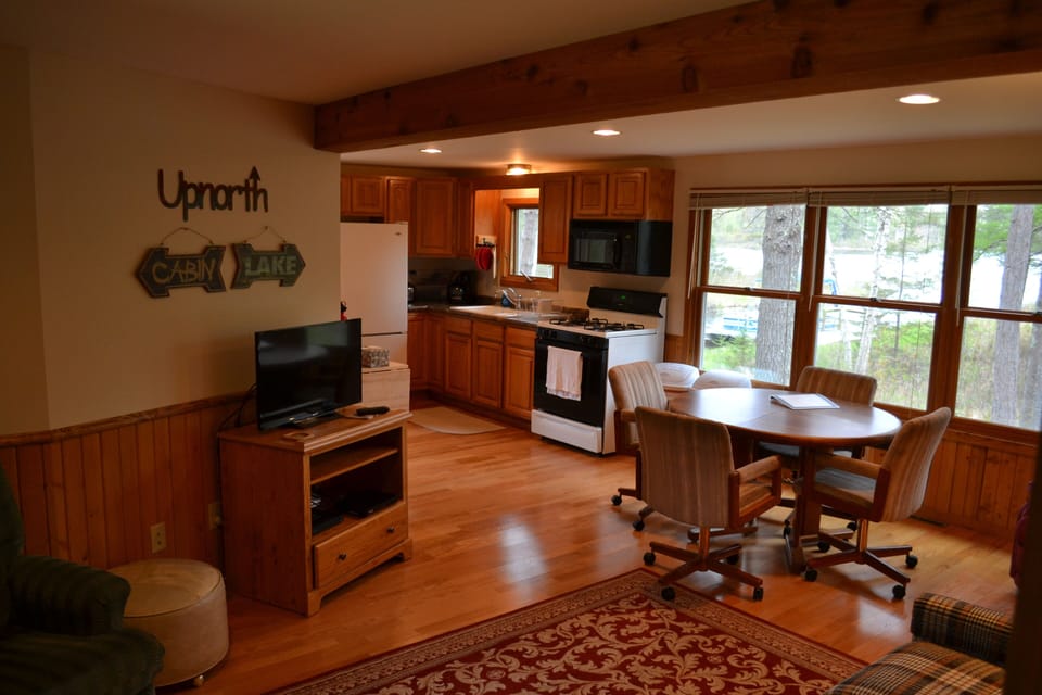 Living room looking into dining room and kitchen