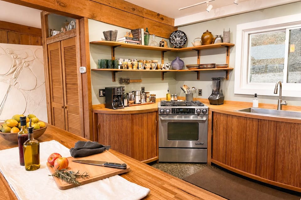 The kitchen designed by Doug Sigler has tamboured cabinets. Outfitted with almost anything you need to cook a meal, making meals has never been easier.