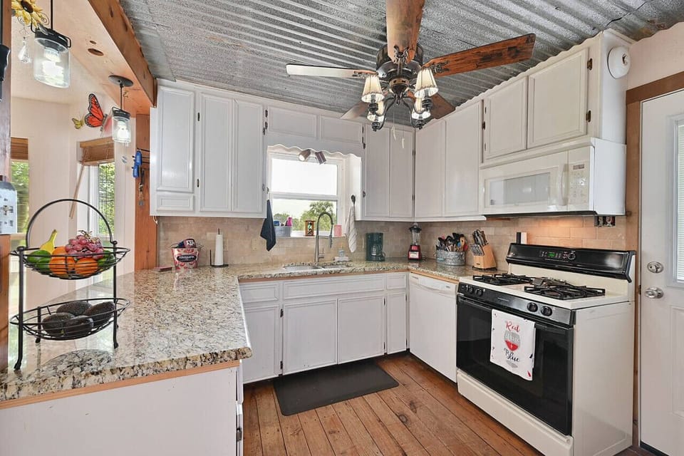 Updates include a new stainless steel 5 Burner Gas Stove,  dishwasher and fridge!