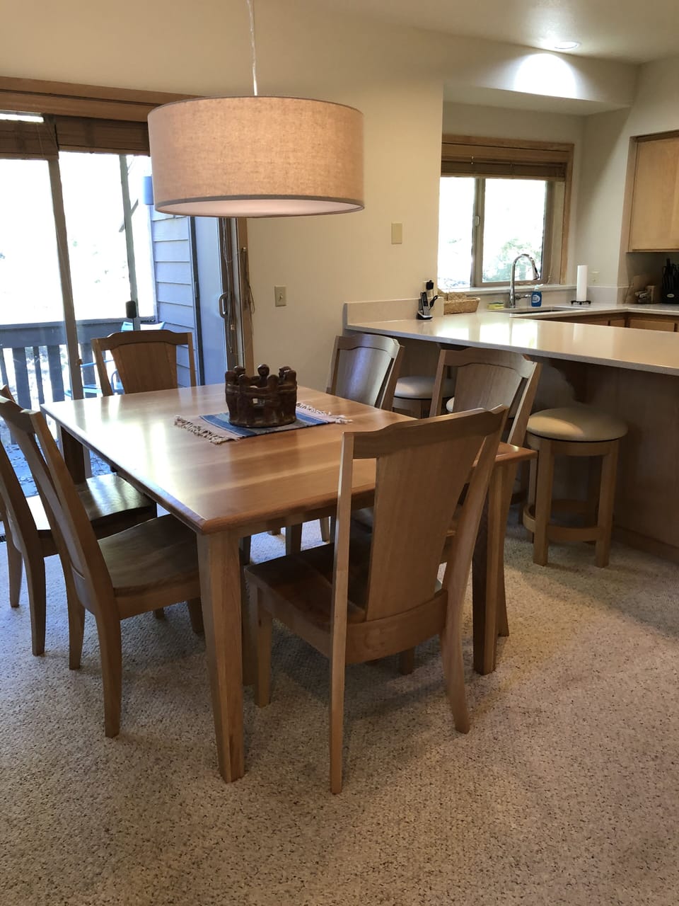 New dining room table with plenty of light for meals, games and puzzles.  