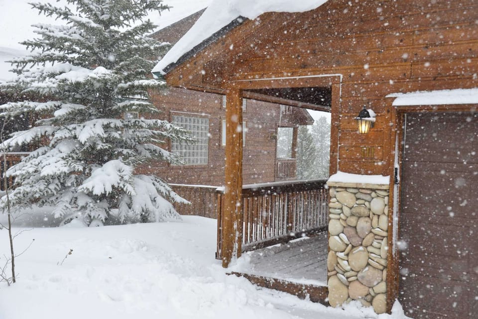 Yes, that is a street-level 2-car heated garage.  And the driveway holds 2 more