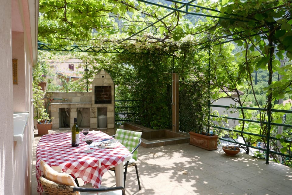 This is the spacious Studio terrace, with  outdoor shower & the grill-station